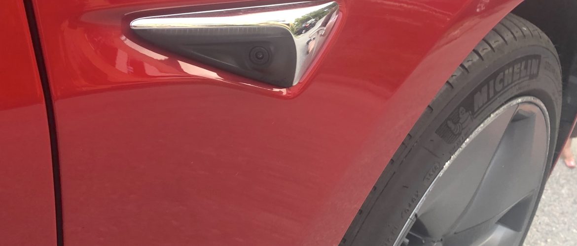 Tesla fangar brotsmann á myndatólinum